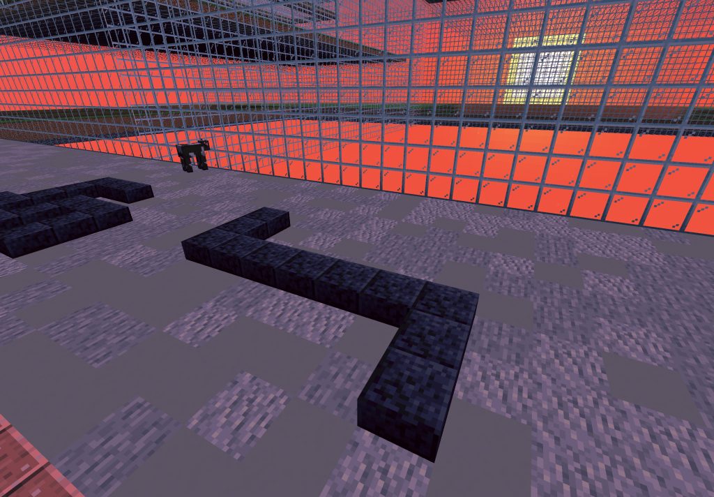 The symbol of 'negation' built with 'Polished Blackstone Slab' is seen against a setting sun in a red sky. Cattle Depot is tinted in red. A cow is in the far background watching the sunset behind the glass grid.