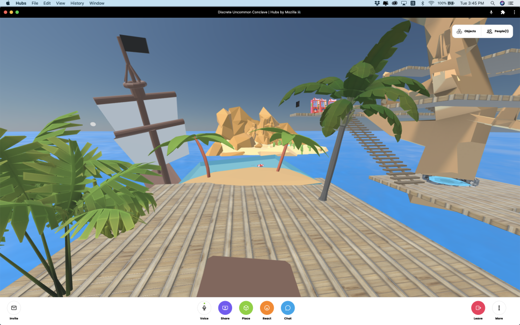 This is a screen shot. A view of beach, pirate ship, rock-ish island.