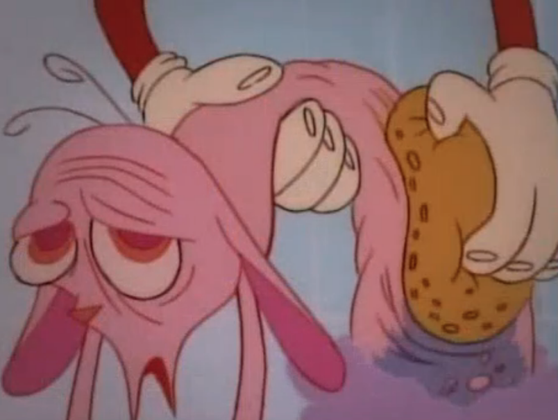A screenshot from the cartoon The Ren and Stimpy Show. Ren is a small and hairless chihuahua dog with beige skin, pink eyes and floppy long pink ears. Stimpy is red/orange Manx cat with a white tummy and hands, wth a round blue nose and a pink tongue often hanging out of his mouth. In this screenshot we see a pink skinned Ren being held in Stimpy's white hands, half out of the water with his body curled over. Stimpy has a big yellow sponge which he is scrubbing Ren's back with. Ren looks simultaneously relieved and embarrassed. 
