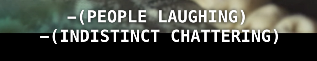 Cropped image of film only showing two lines of subtitle that says (PEOPLE LAUGHING) and (INDISTINCT CHATTERING). Behind the text, there's blurred image of dumplings on plate.