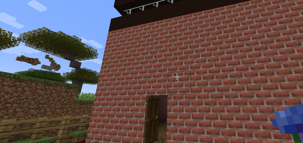 Screenshot of the back of my Foredown tower a brick wall with a door.