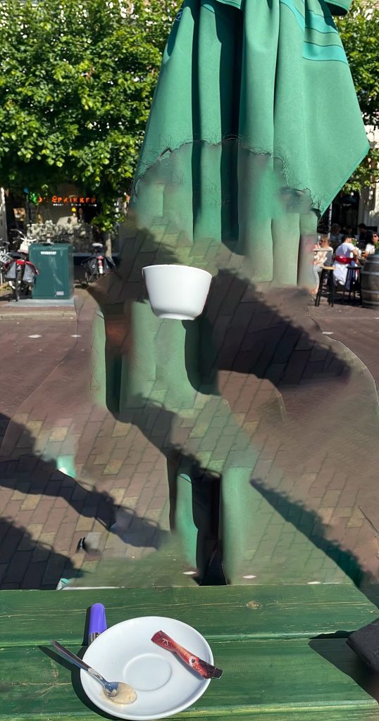 Invisible silhouette holding up a white cup. There is a cafe and green umbrella in the background. The bottom image shows a cup saucer, spoon, sugar packet, and purple lighter. 